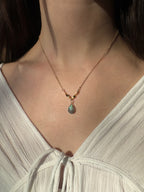 Gold filled labradorite drop necklace on a model.