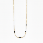 Ellipse cuban chain necklace in gold filled with diamond-shaped links.