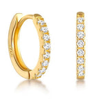 Tink huggie hoop in 18K gold vermeil set with cubic zirconia, front and side view showing the 925 sterling silver base.