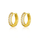 Pair of Sage huggie hoops in 18K gold vermeil set with cubic zirconia.